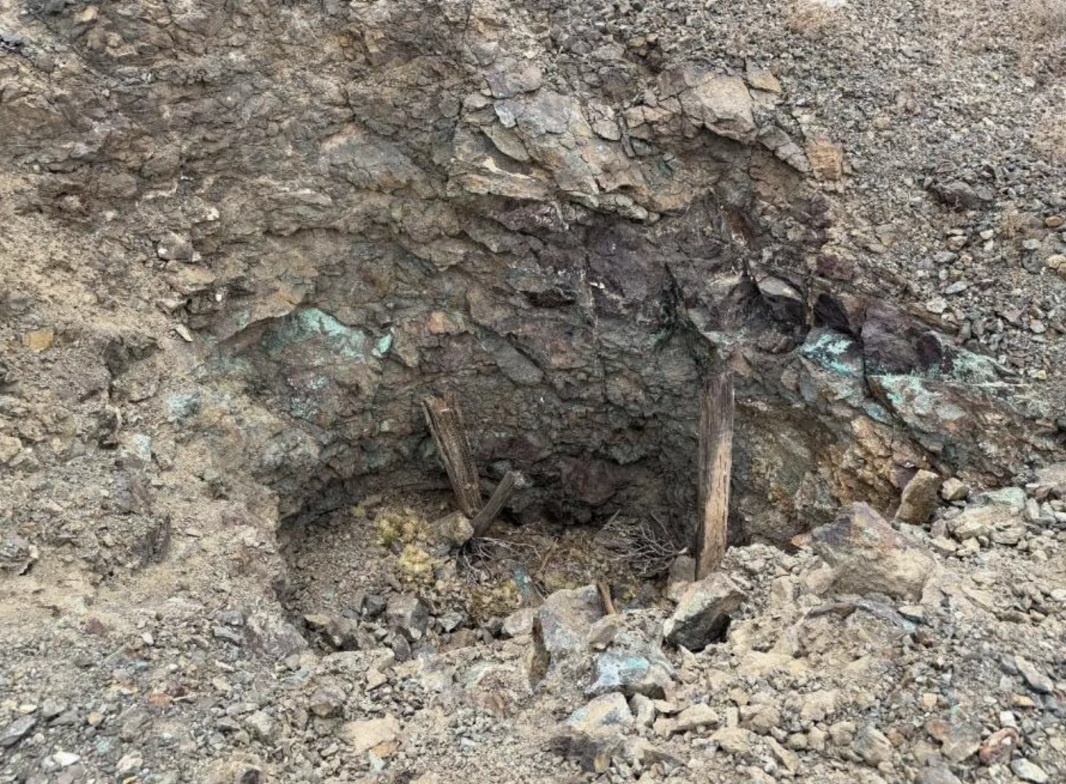 Copper-stained (malachite–azurite) shaft collar at the main American Eagle workings.