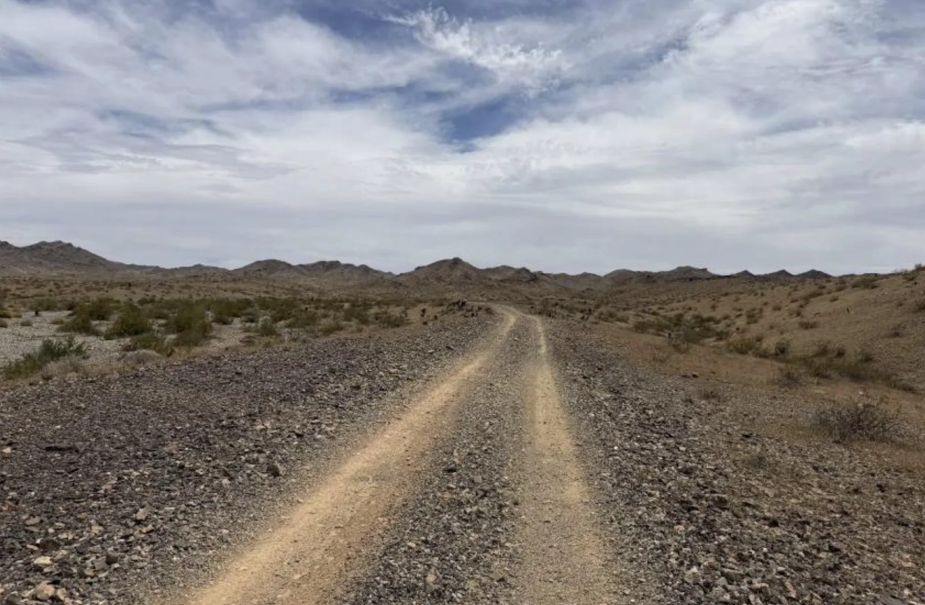 Graded access road crossing the property.