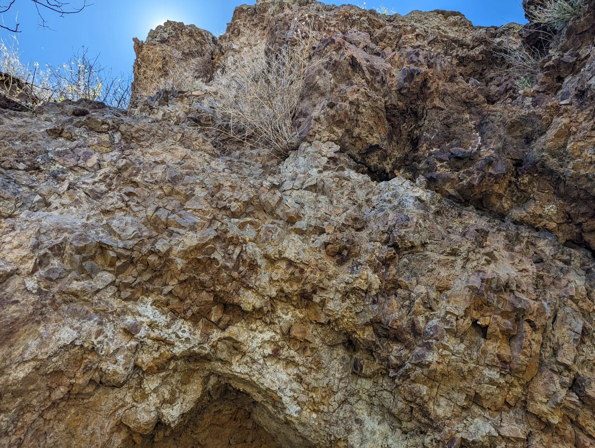 Iron-oxide stained outcrop face at Great Western Project