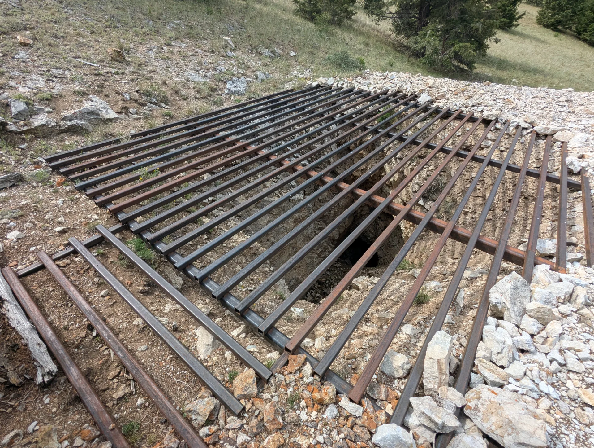 Steel safety grate over an open shaft at the historic Sims workings.